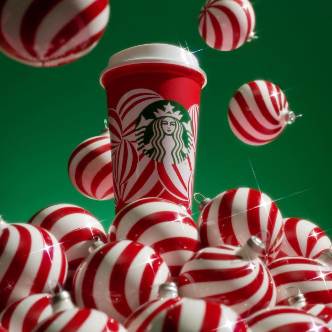 STARBUCKS - Dec A Starbucks peppermint coffee cup with ornaments painted like peppermints